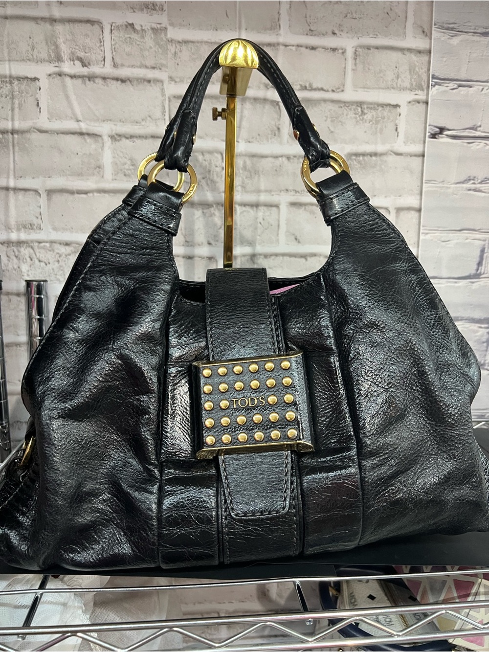 Tod's Black Leather Shoulder Bag with Gold Stud Detail